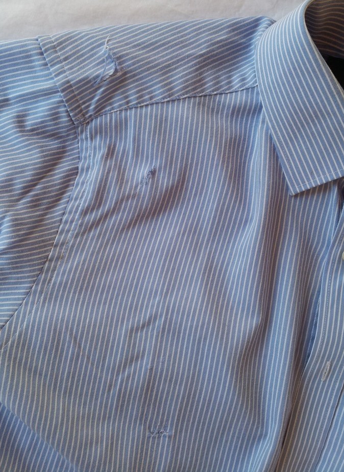 Upcycling a damaged shirt